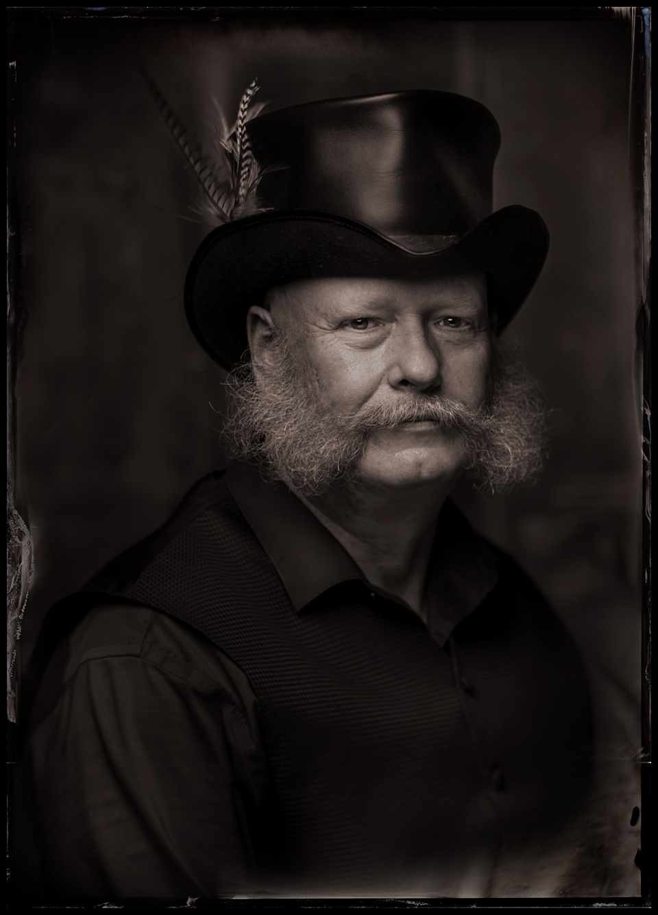 tintype of a man with a fuzzy wild natural beard
