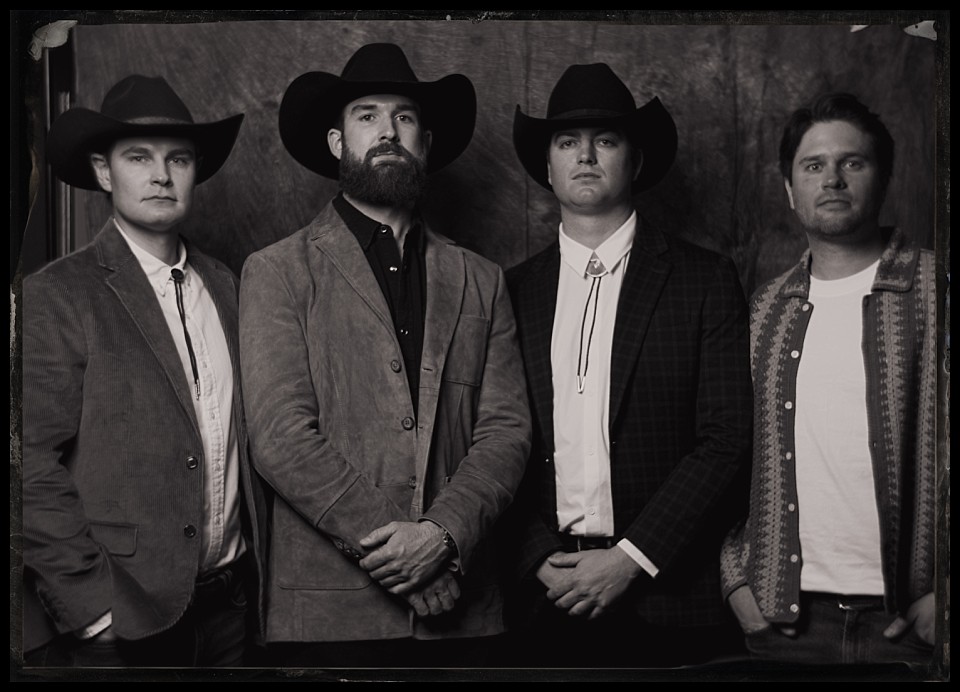caribou club wedding welcome party tintypes in aspen portrait of wedding dudes