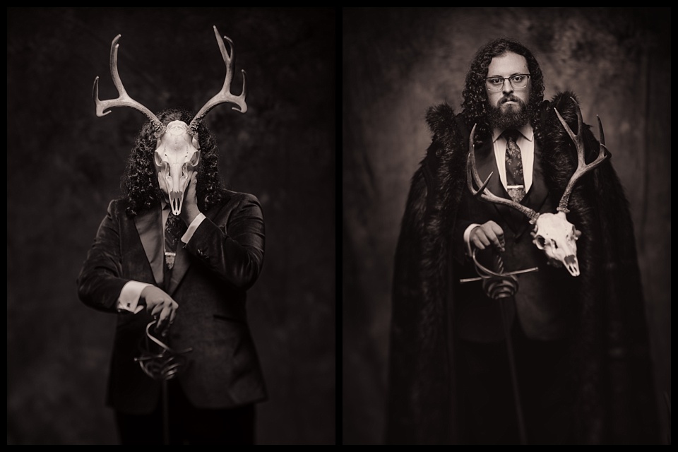 gothic styled groom with a sword and deer skull