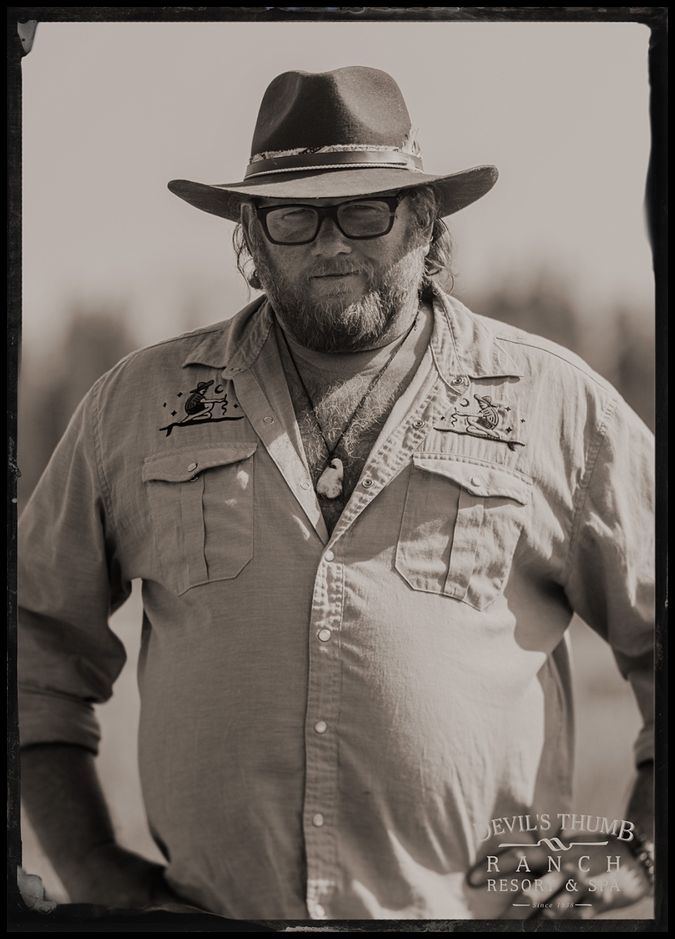 labor day tintypes devils thumb ranch big burly cowboy in western shirt
