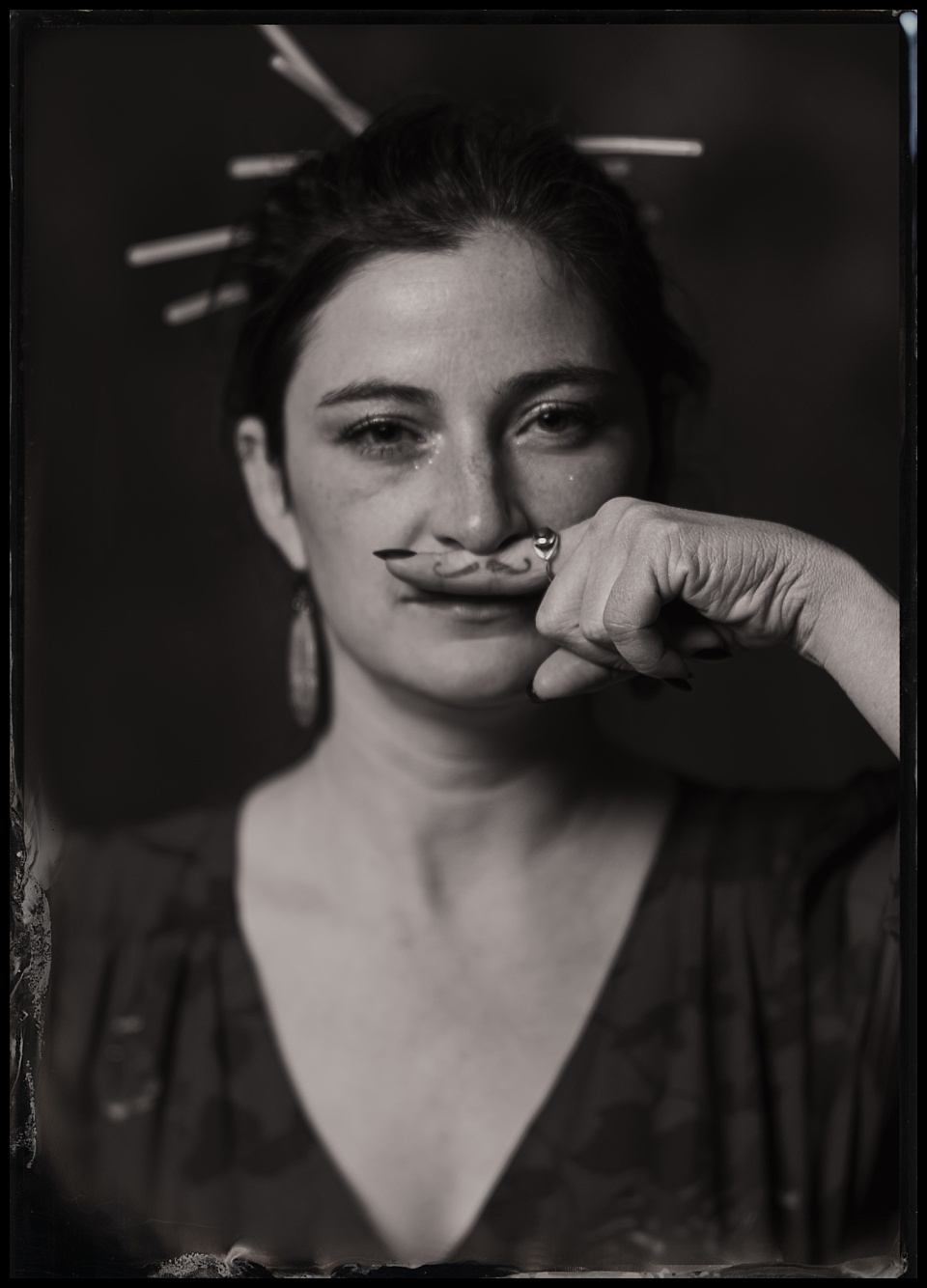 surf lodge buena vista wedding tintype photobooth lady with mustache tattoo