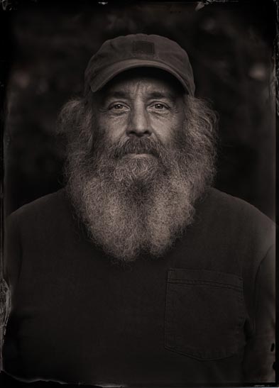 wet plate portrait of a couple with woman in hat