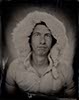 denver male wet plate portrait wearing a large hooded coat